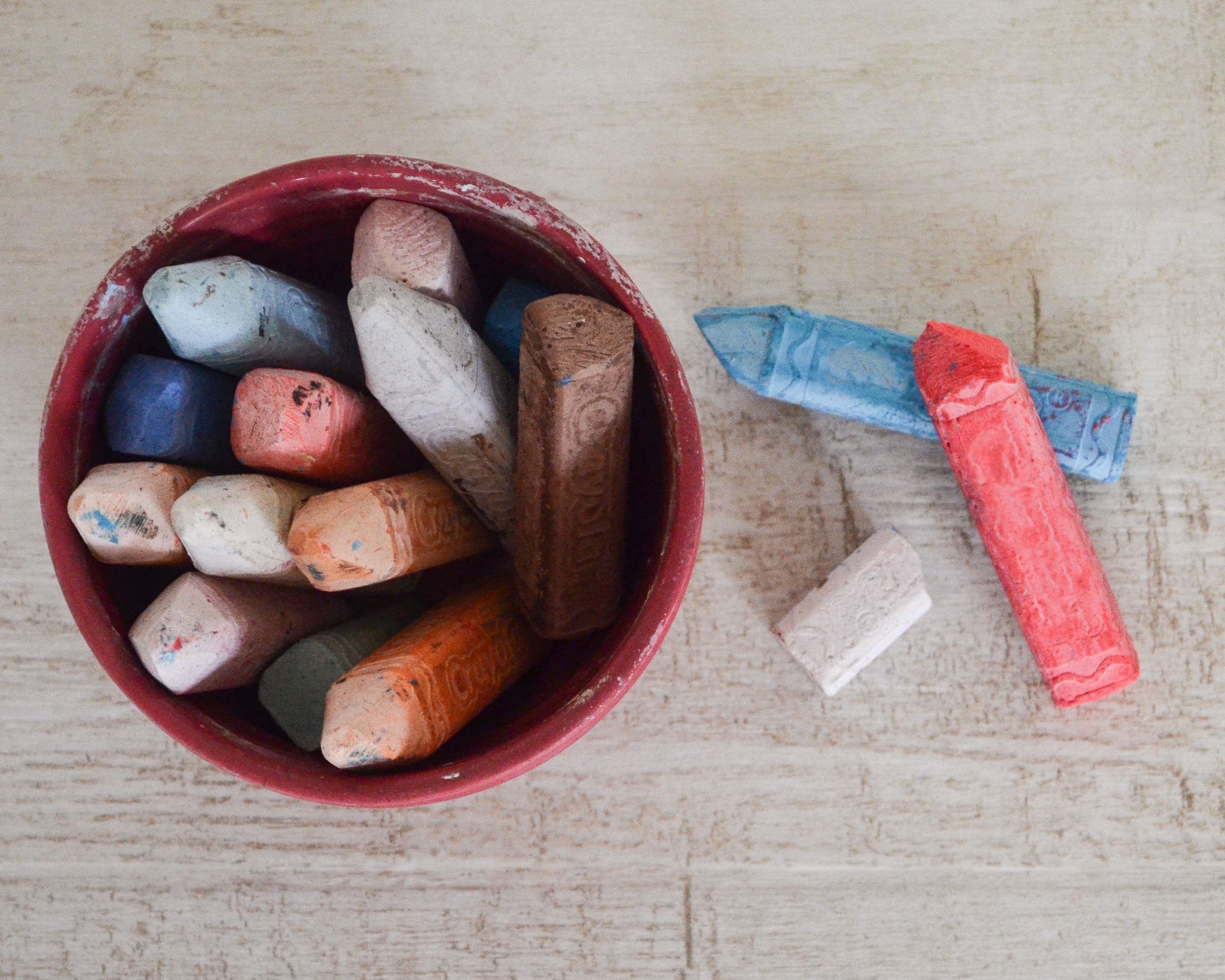 Chalk crayons in a bowl